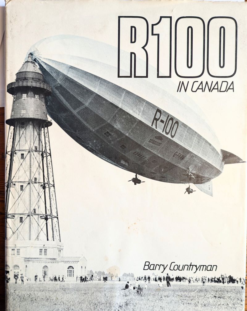 Picture of book cover showing large airship moored to a tower with a crowd of people beneath.